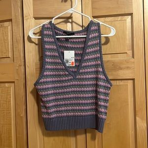 Pink, purple, and green sweater vest